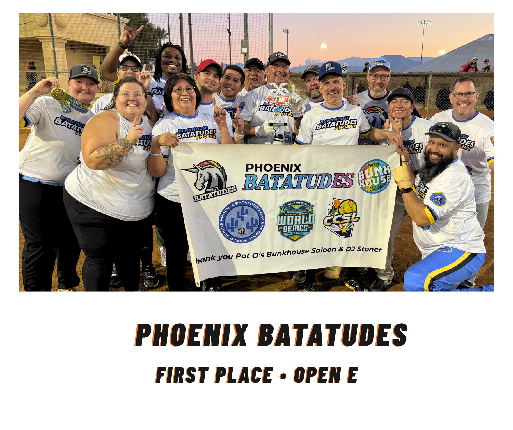 Phoenix Batatudes team posing with trophy banner at sunset, first place in Open E.