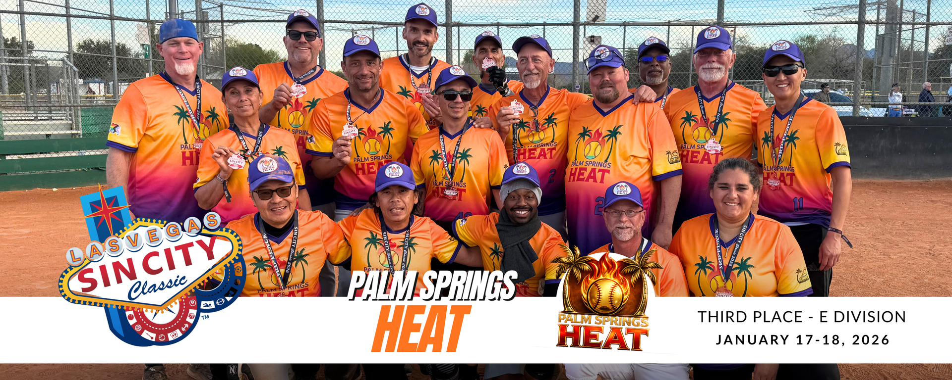 Central City Heat baseball team posing in orange uniforms on a field, with championship logos and banner.