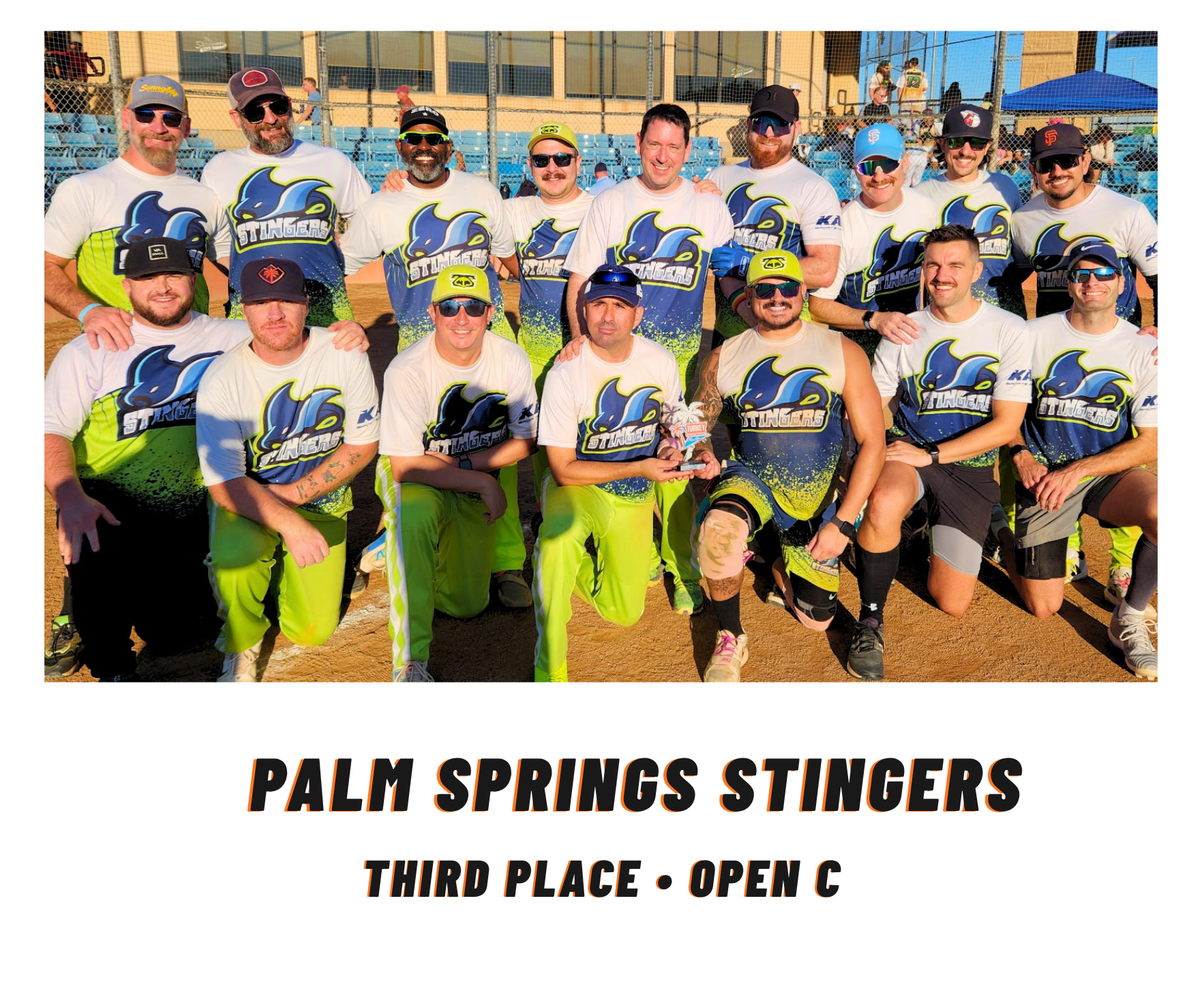Palm Springs Stingers team photo with trophy, captioned “Twob Place • Open C”