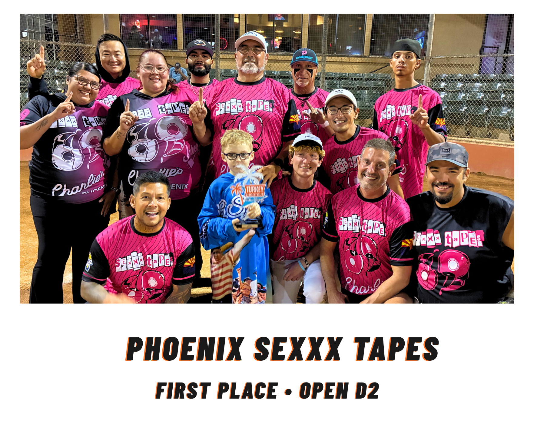 Phoenix Sexxy Tapes softball team posing together after winning first place in Open D2.