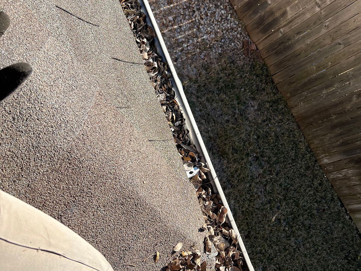 Full gutters which would cause a clog