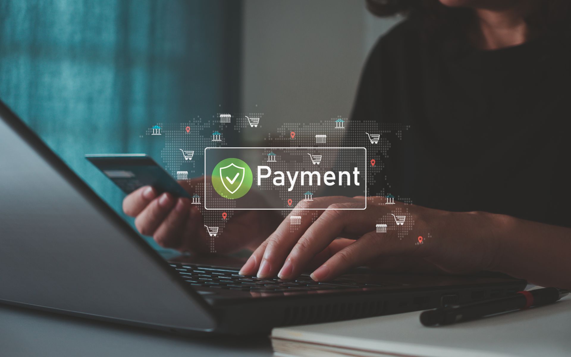 Person making an online payment on a laptop using a credit card. Person making an online payment on a laptop using a credit card.