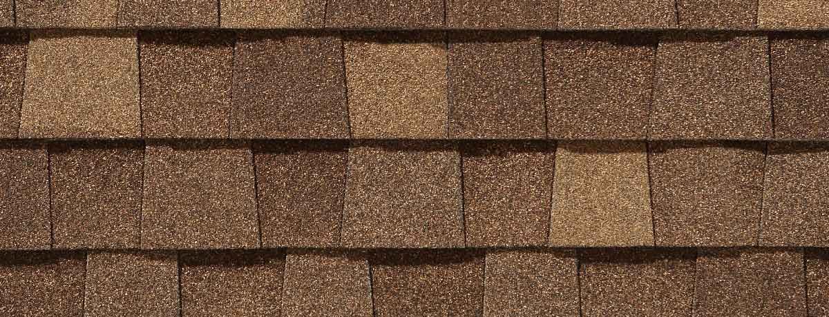 Brown and tan asphalt roof shingles.
