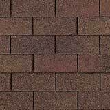 Close-up of brown, textured asphalt roof shingles.