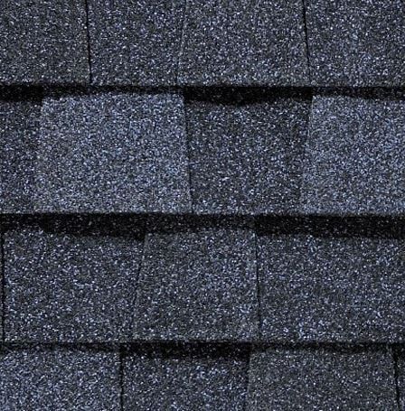 Dark gray asphalt roof shingles.