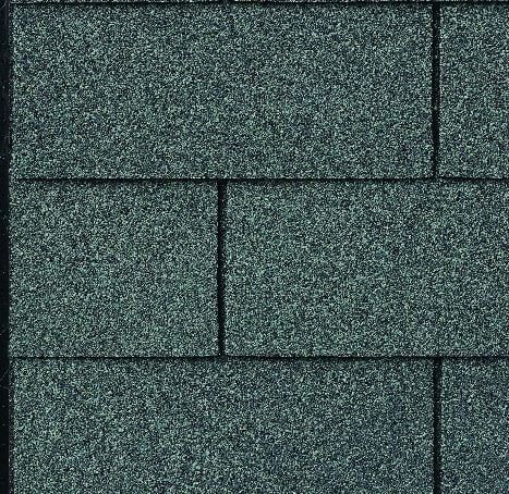Dark teal asphalt roof shingles.