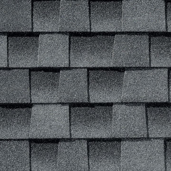 Dark gray asphalt roof shingles.