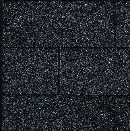Close-up of dark gray asphalt roof shingles.