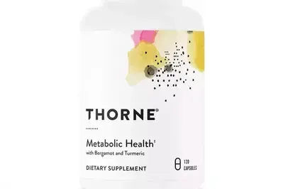 A bottle of thorne metabolic health with bergamot and turmeric dietary supplement