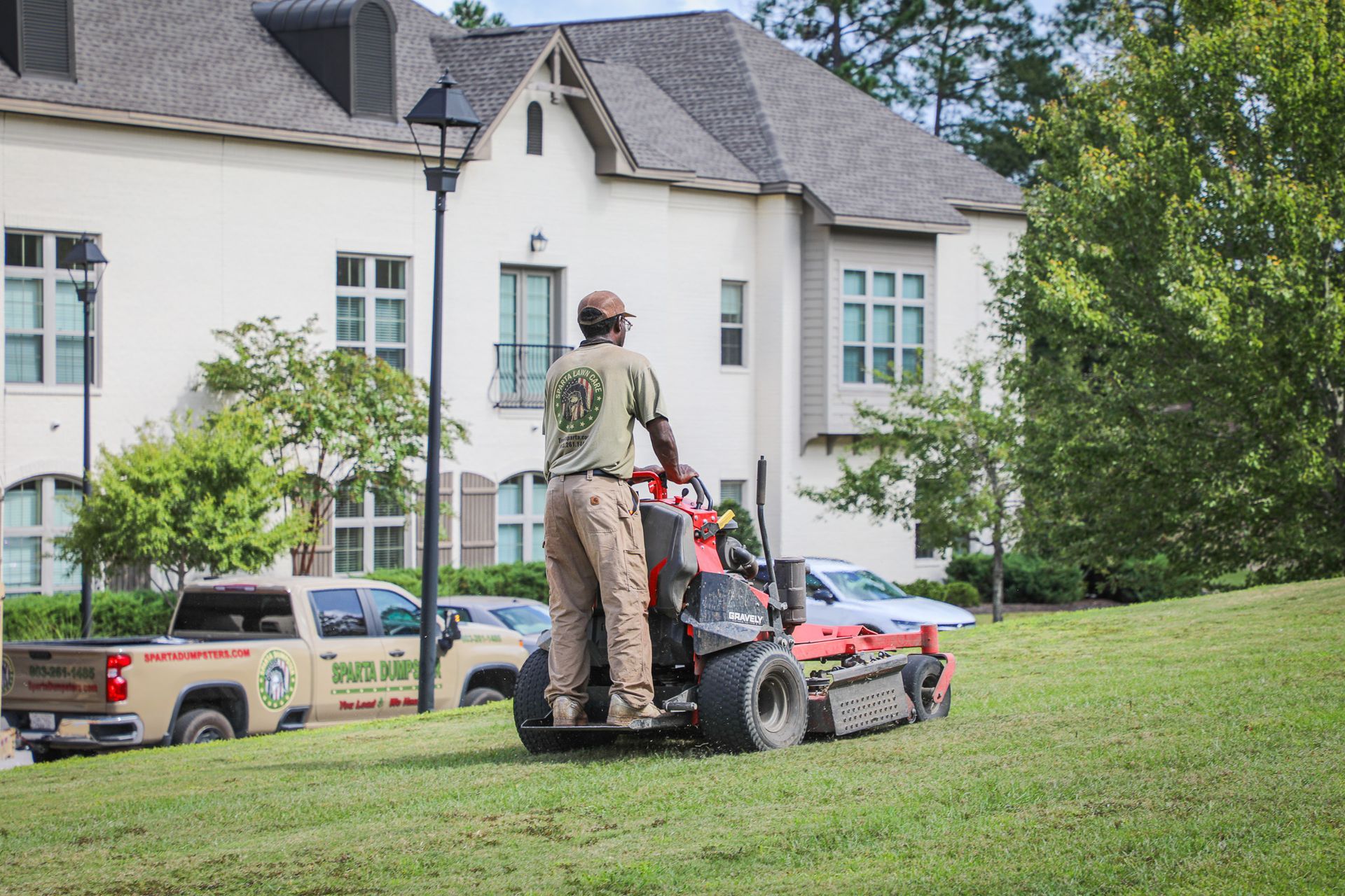 Sparta Lawn Care mowing a residential lawn in Columbia, South Carolina