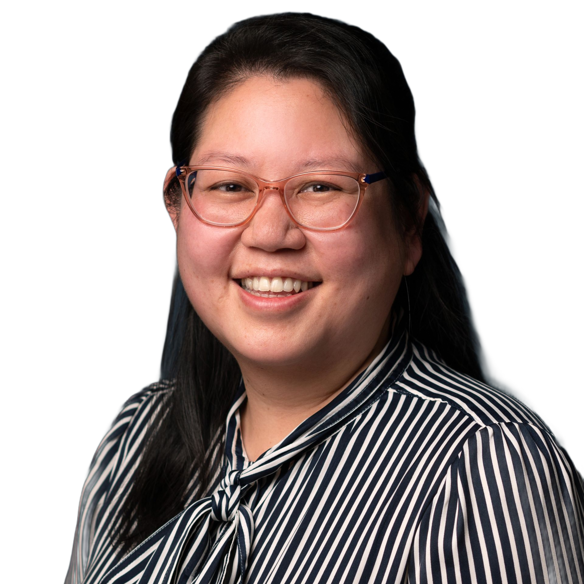 Woman wearing glasses smiling at the camera, wearing a striped blouse.