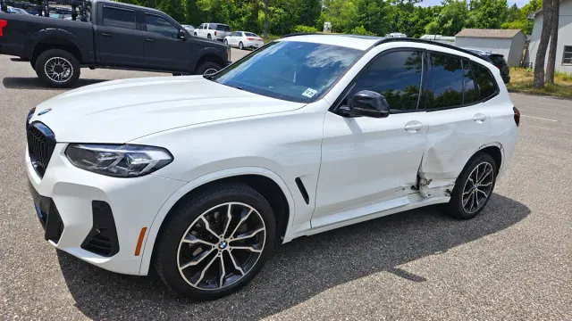 BMW X3 before: left-side collision repair at Auto Craftman and Collision in Island Heights