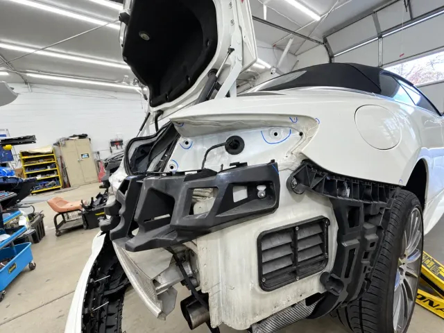 Mercedes-Benz S550 Cabriolet during repair: rear-body and bumper repair at Auto Craftman and Collision in Island Heights
