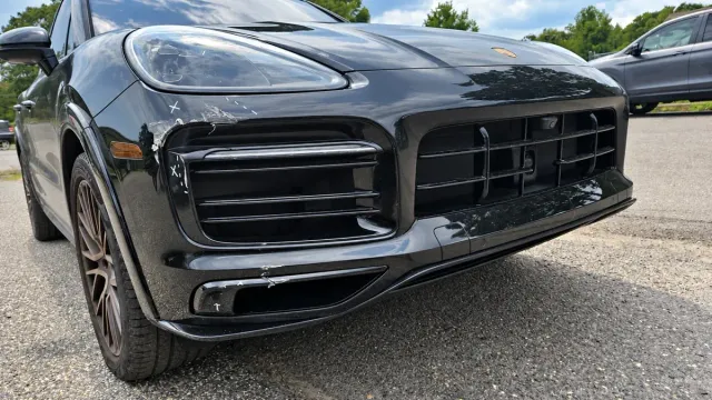 Porsche Cayenne E-Hybrid before: front-bumper repair and refinishing at Auto Craftman and Collision in Island Heights