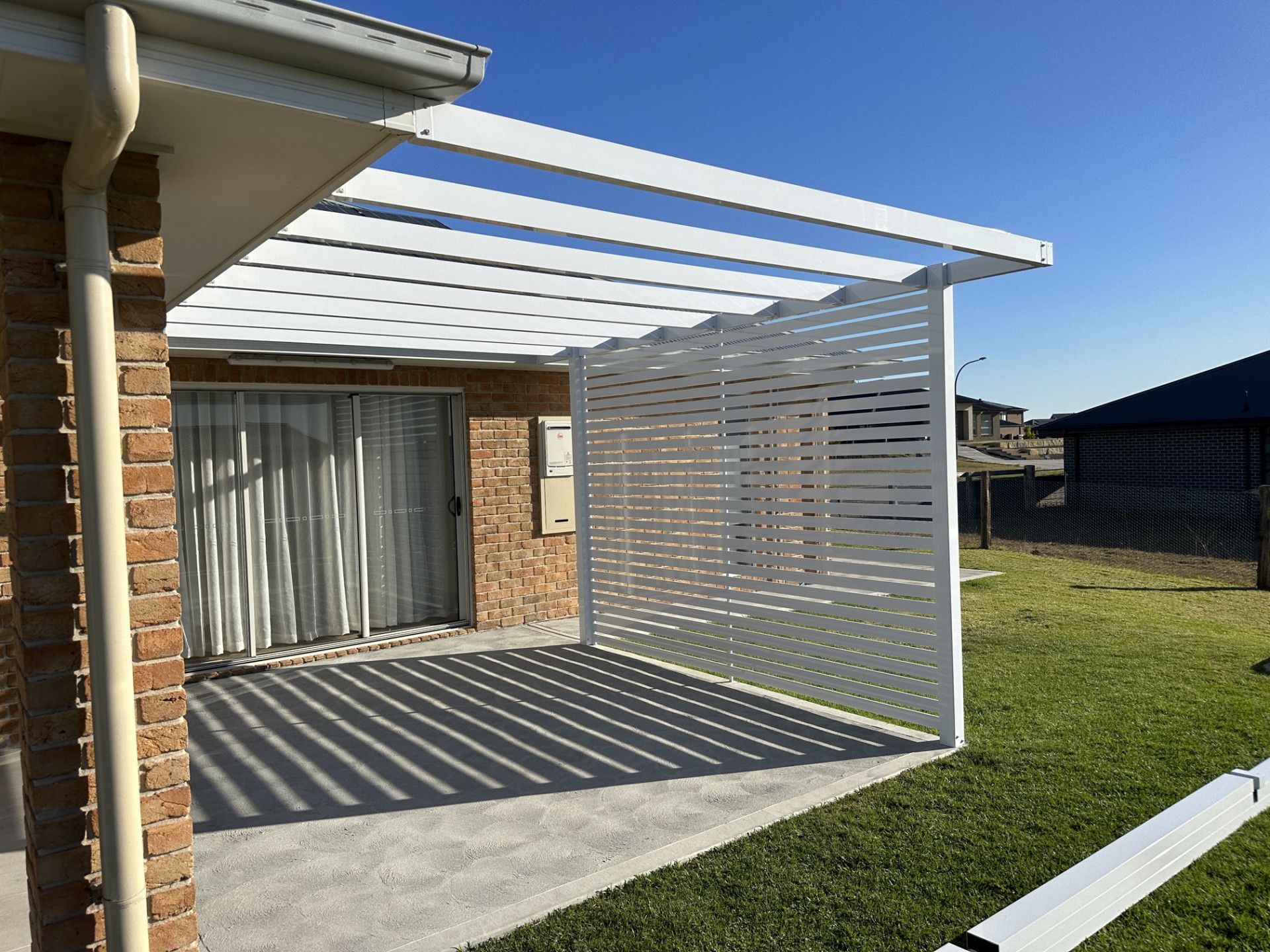 A White Pergola From Lil' Shelters Done Right — Kimick Roofing Solutions In Wyong, NSW