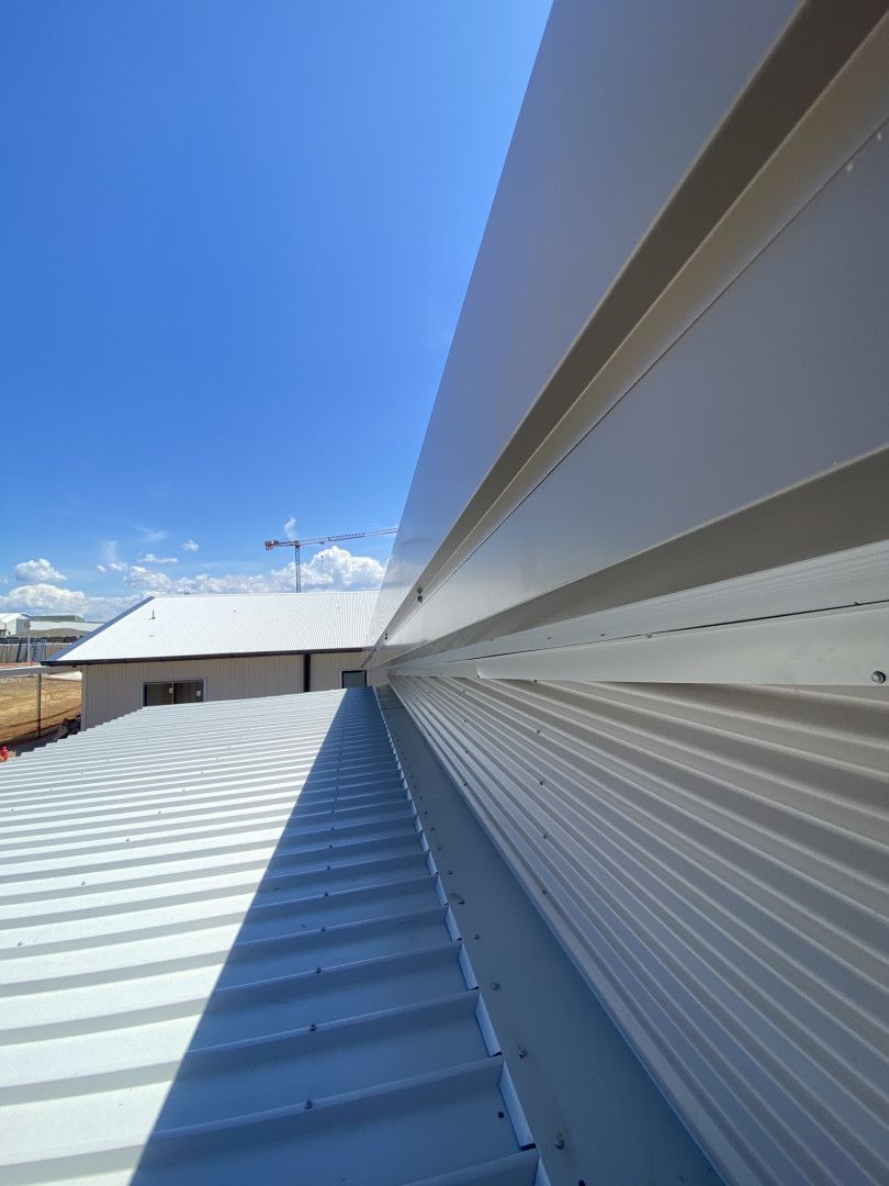 A Close Up Of A Metal Roof — Kimick Roofing Solutions In Blacktown, NSW