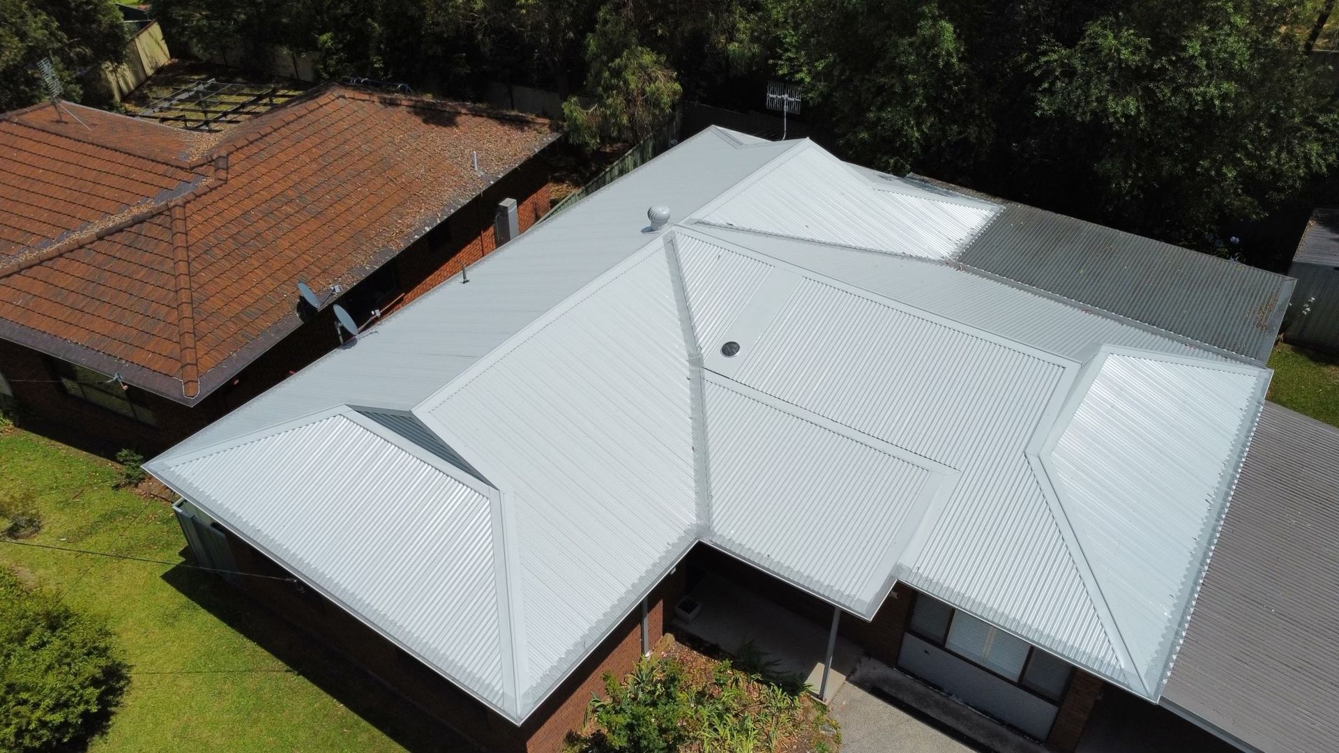 A House With A Metal Roof — Kimick Roofing Solutions In Wyong, NSW