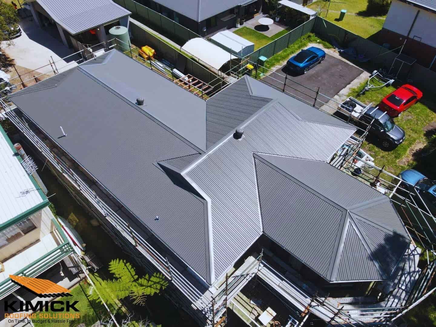 An Aerial View Of A House With A Gray Roof — Kimick Roofing Solutions In Wyong, NSW