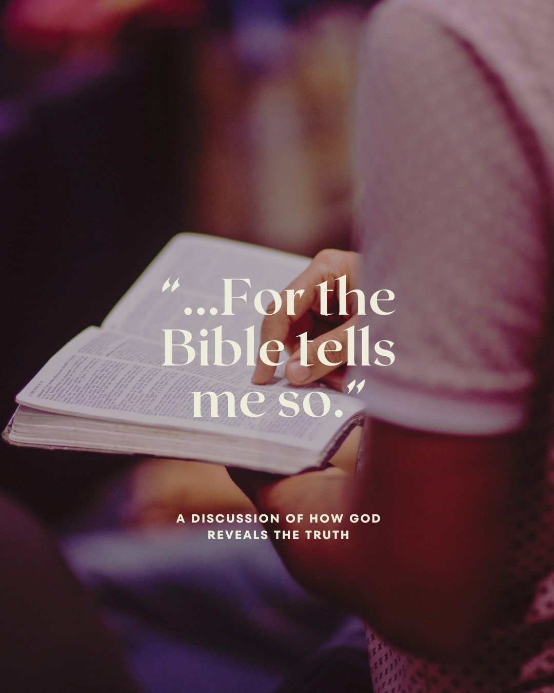 A person holding a bible that says