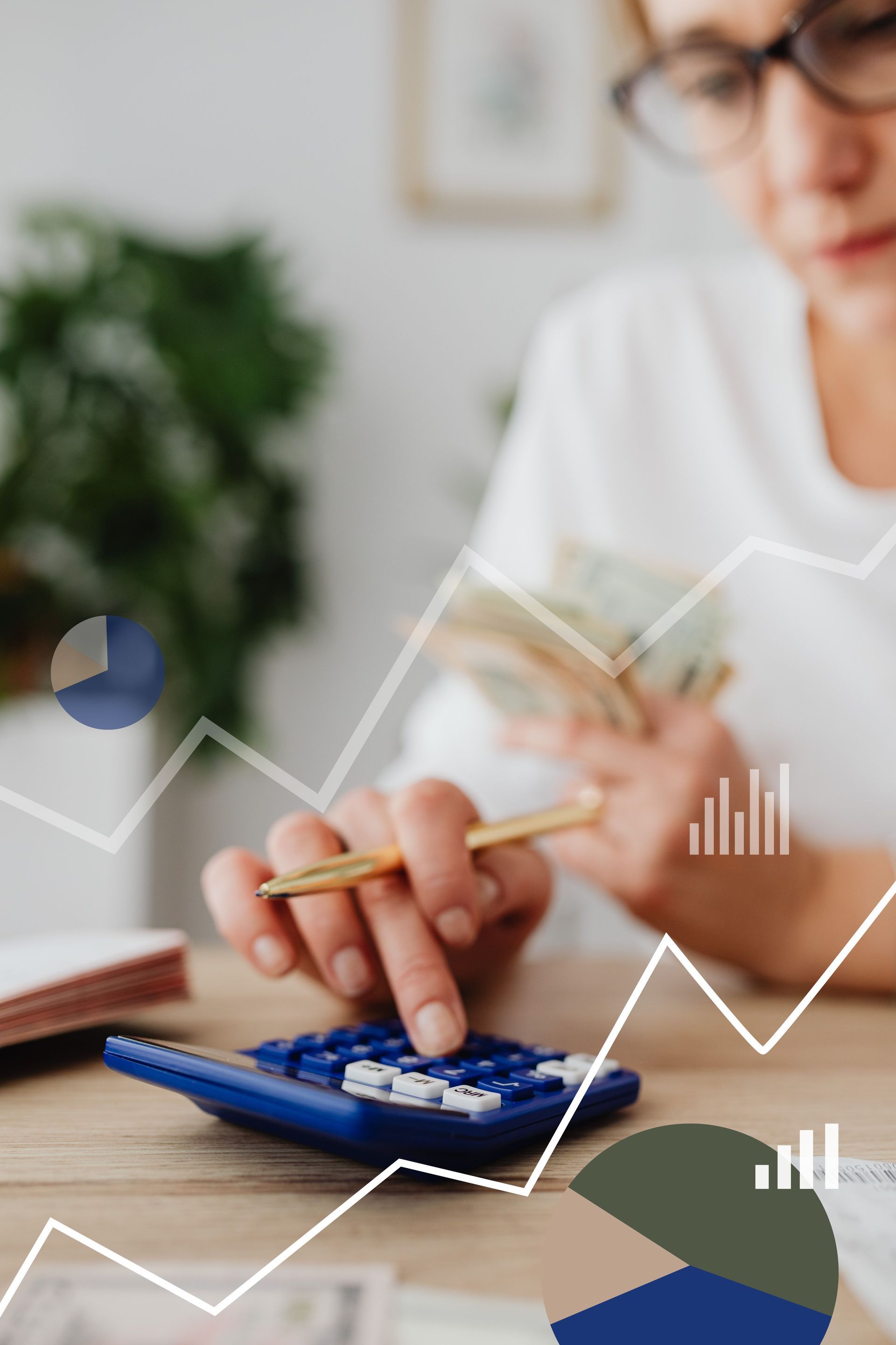 SheCounts LLC team member reviewing financial statements at Salt Lake City office desk