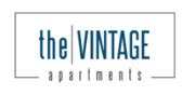 Logo for “the VINTAGE apartments” in blue and gray on a white background