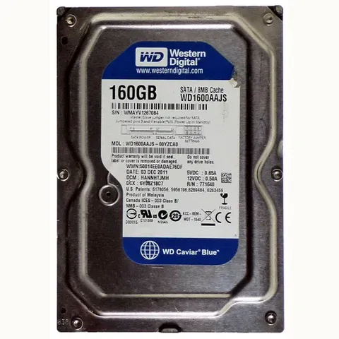 Western Digital 160GB hard drive label on a metal computer disk drive