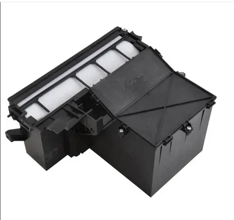 Black plastic air filter housing and intake assembly on a white background