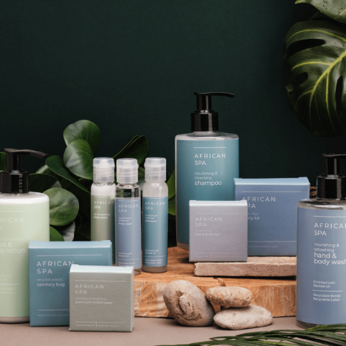 African Spa bath products in a spa-like setting; green, blue, and gray bottles and soaps