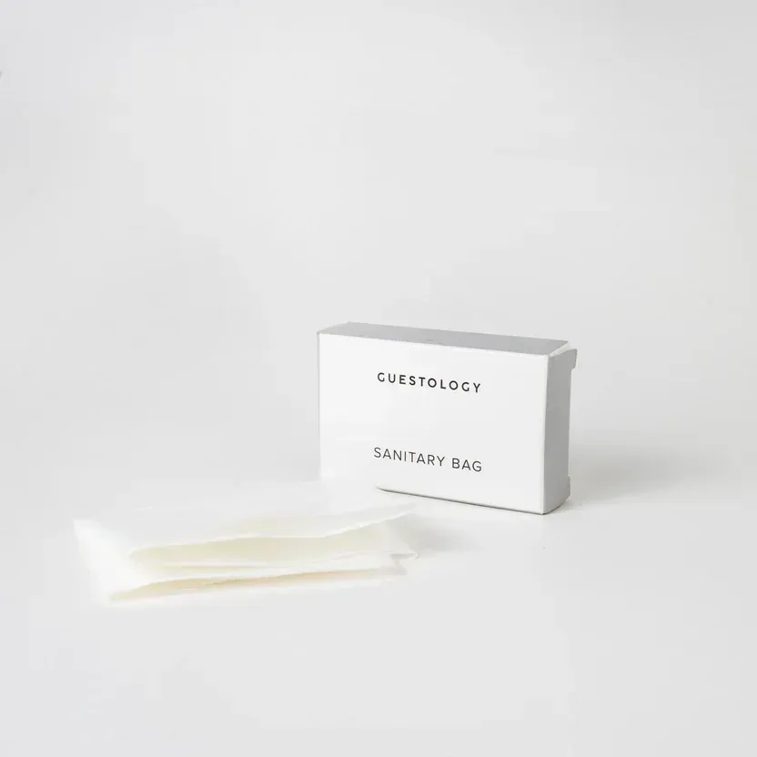 Small brown paper packet labeled 