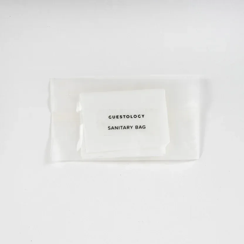 Small brown paper packet labeled 