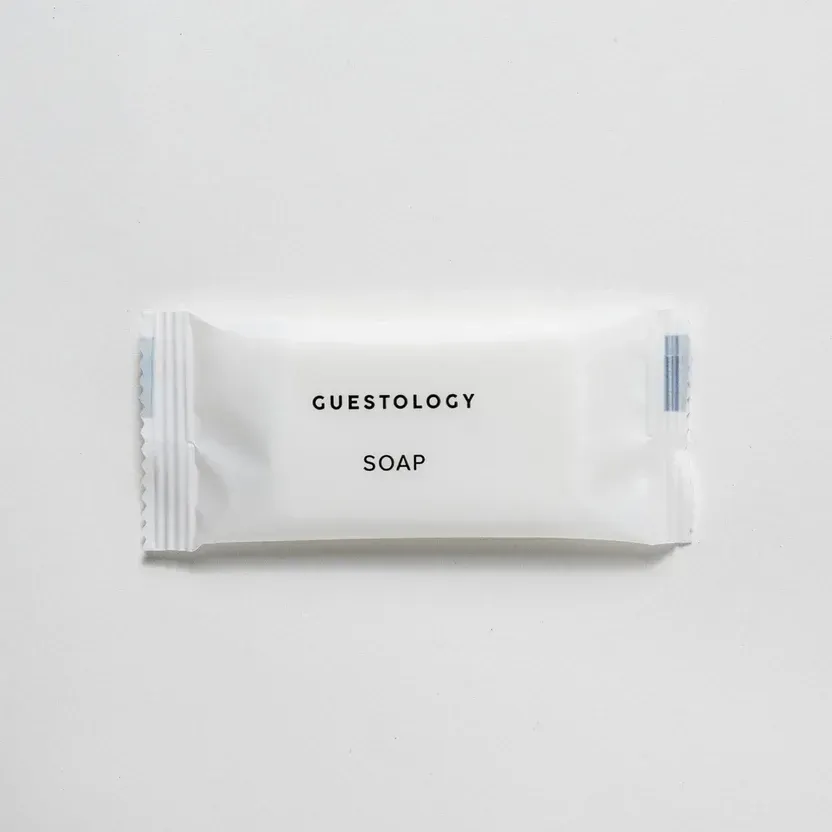 Small brown paper packet labeled 