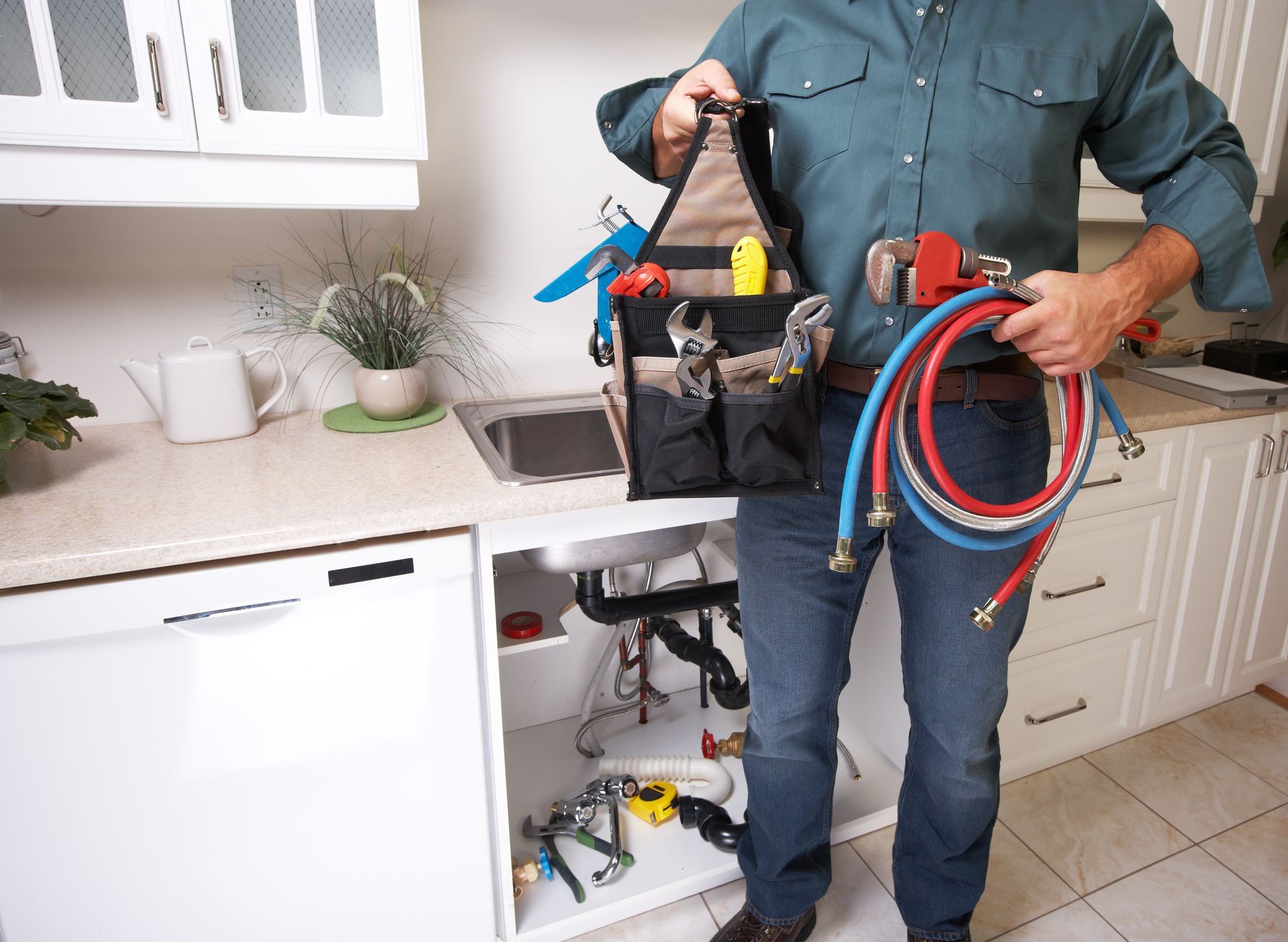 Licensed plumber with equipment ready to handle residential plumbing repairs. Licensed plumber with equipment ready to handle residential plumbing repairs.