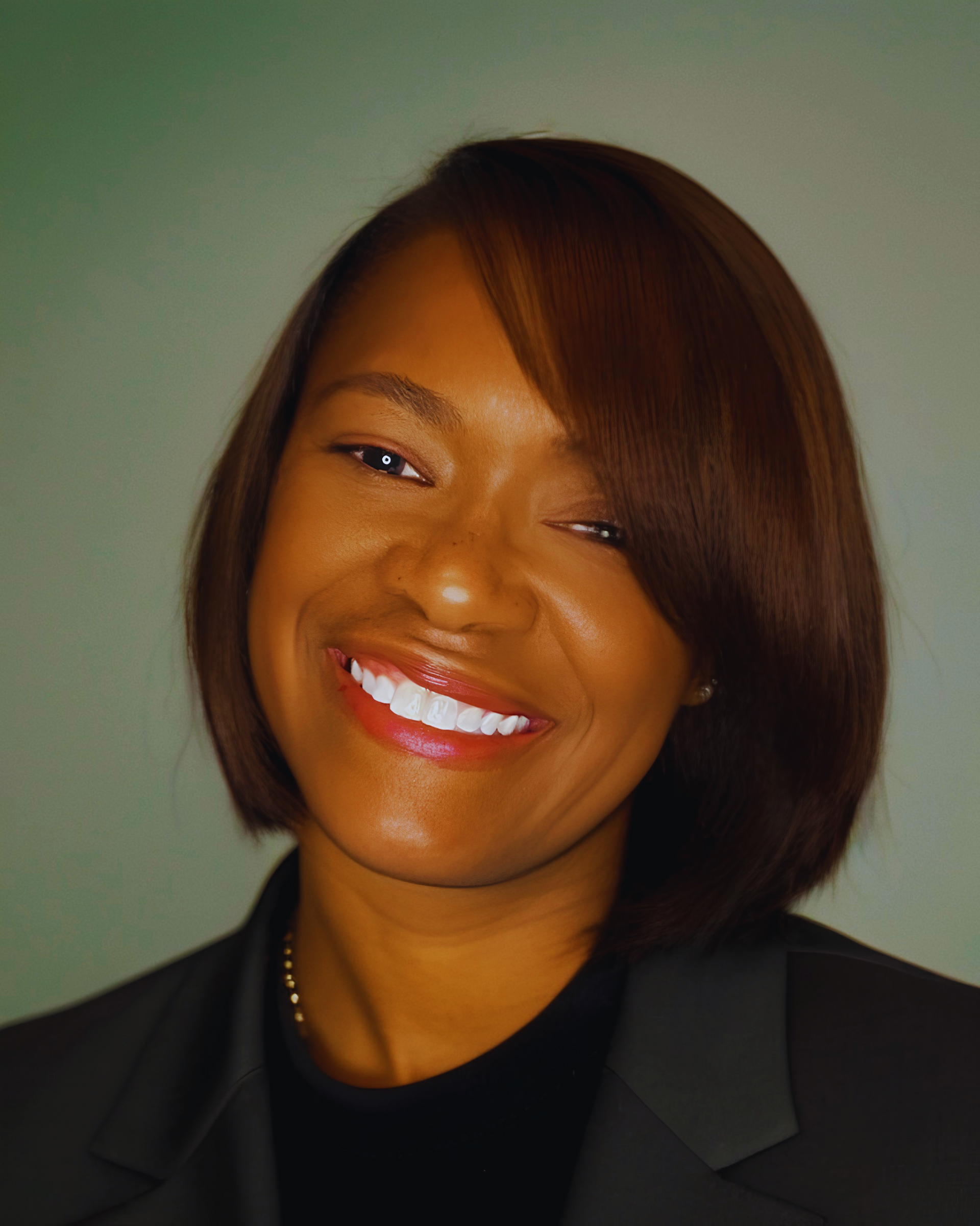 A professional portrait of Dr Toni Small