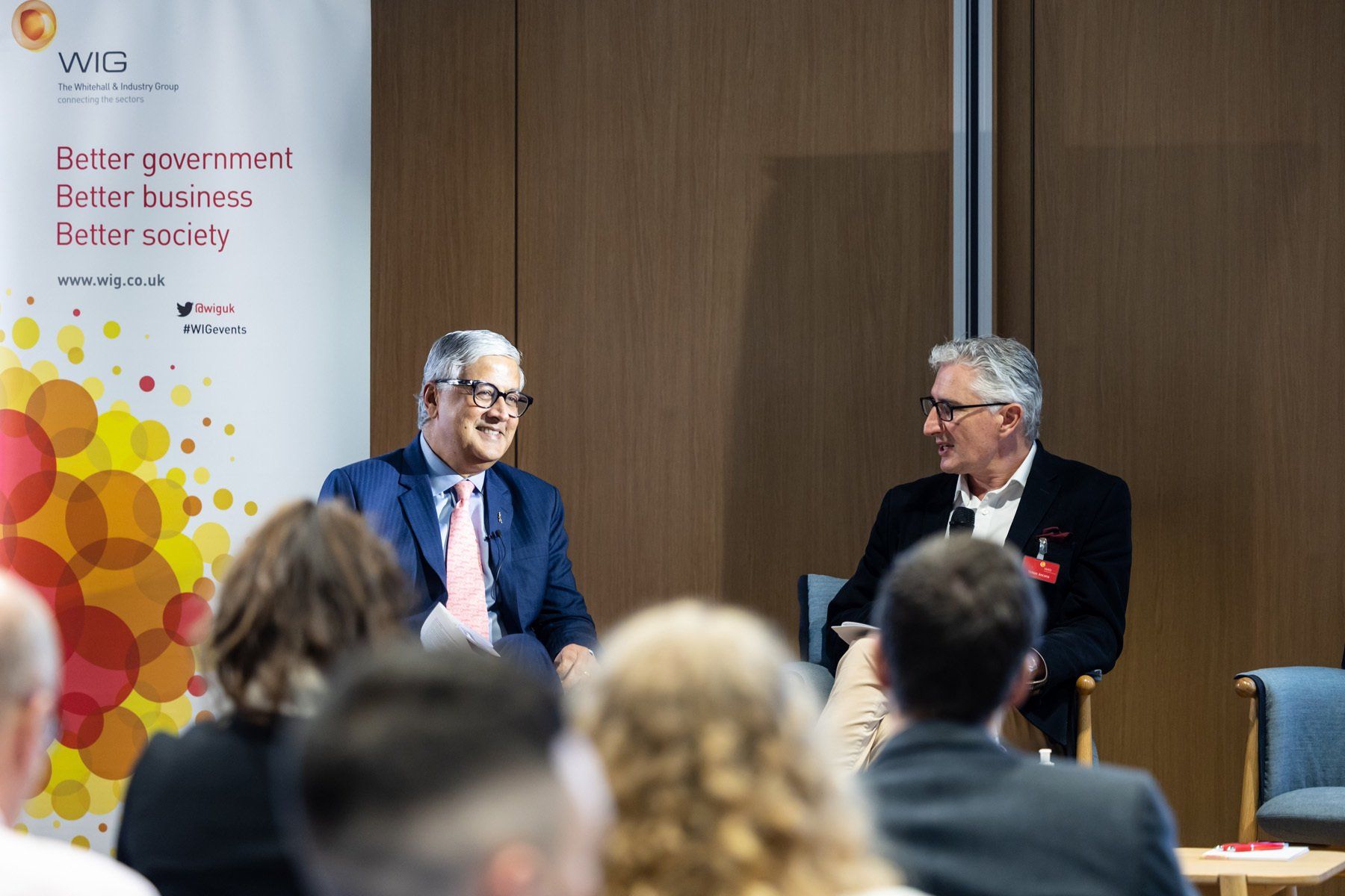 event photography reading, two male speakers on stage