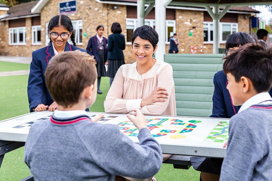commercial photographer berkshire, students with head teacher in playground