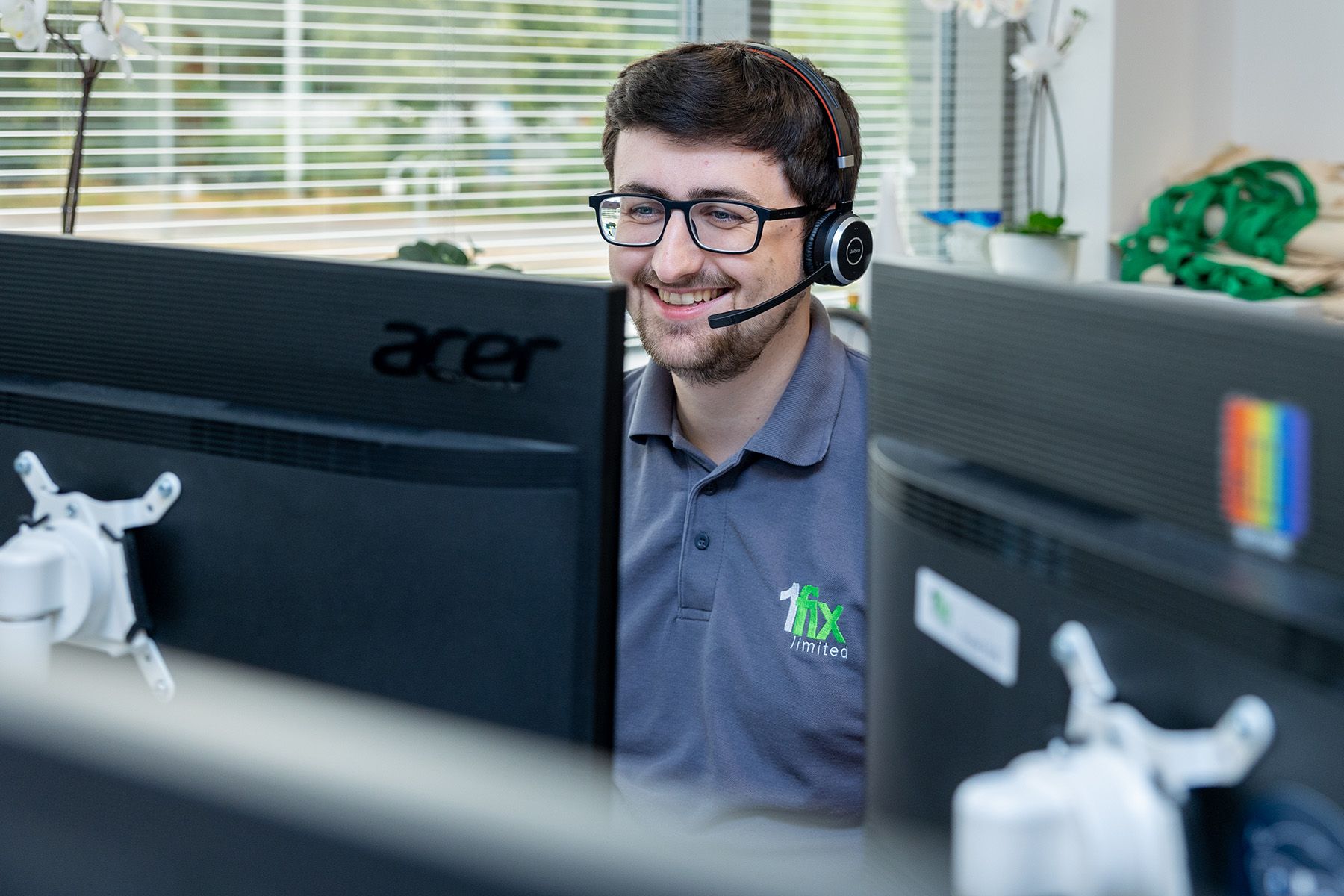 Commercial photographer reading, IT support worker on phone