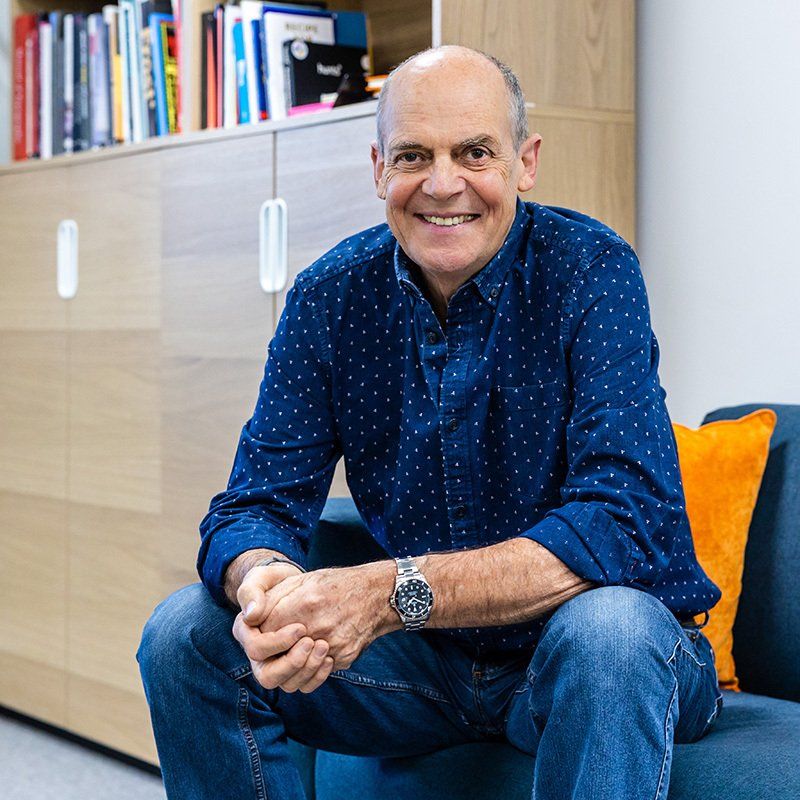 Commercial photographer reading, male executive headshot