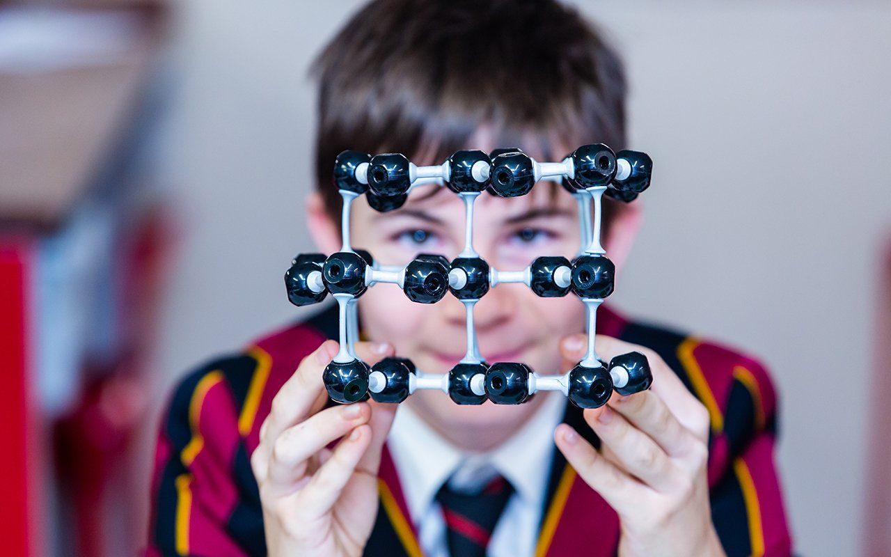 Commercial photography reading, male pupil