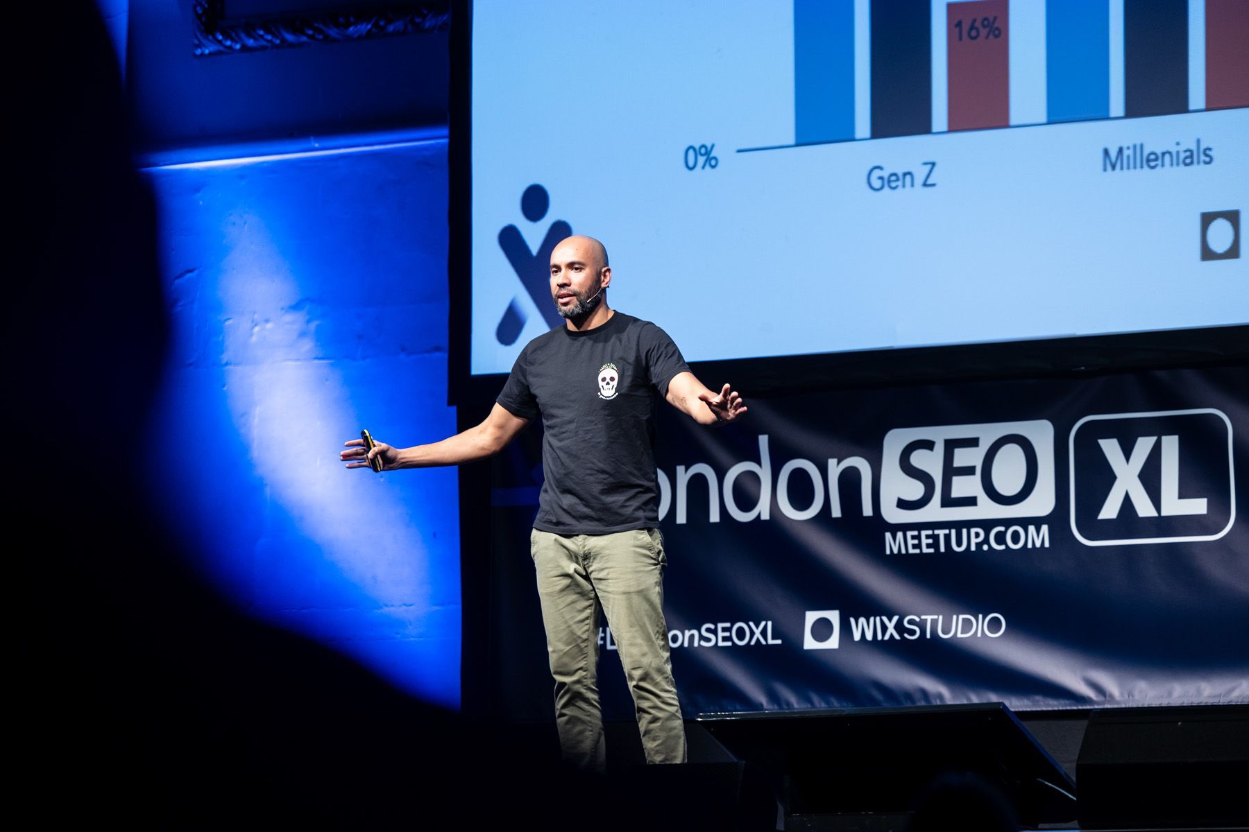 event photographer berkshire, male presenting on stage at london corporate event