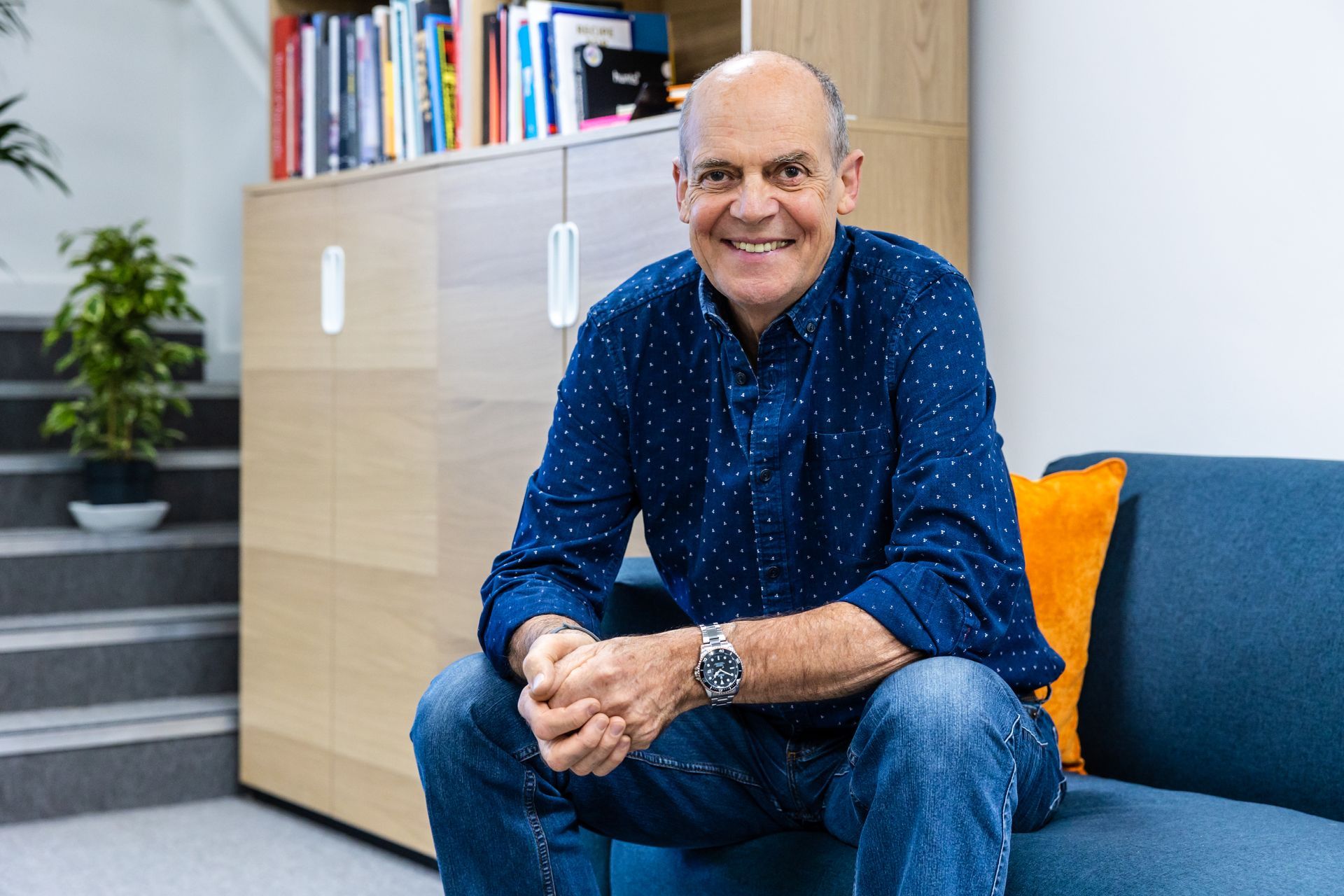 Headshot photographer Berkshire, male business owner headshot on sofa