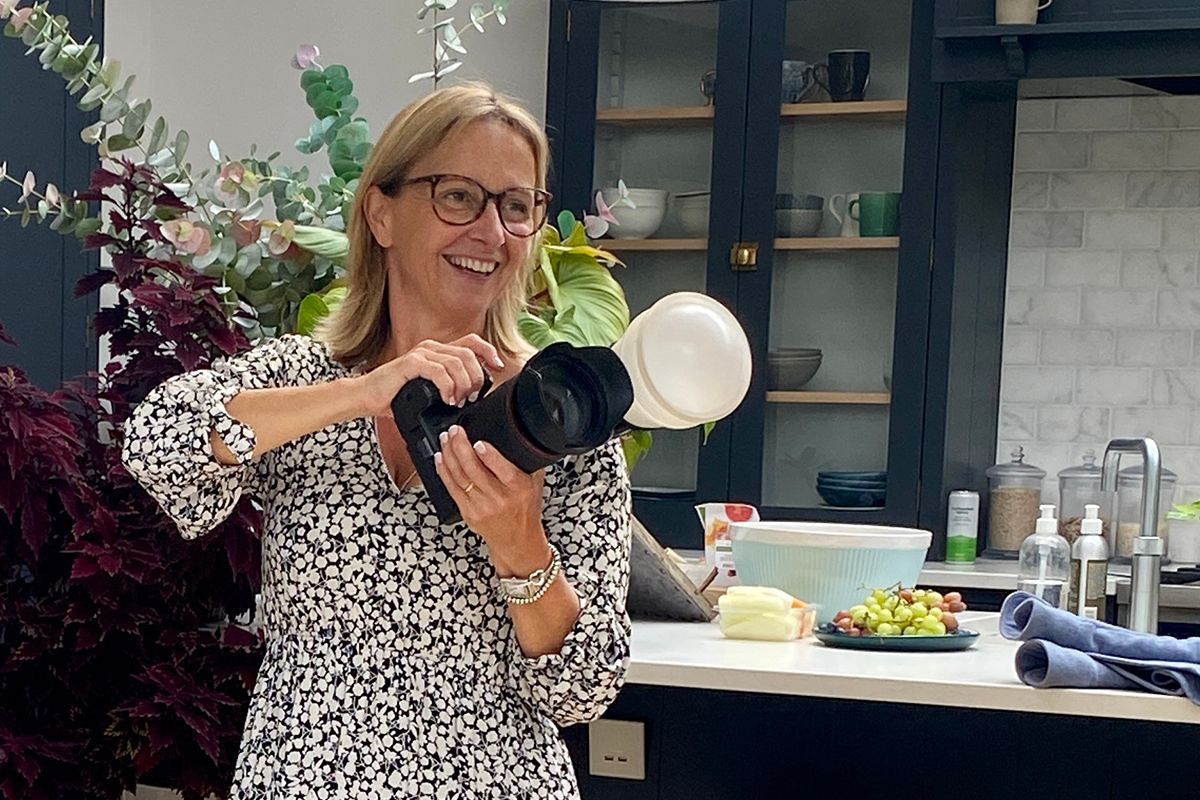 Commercial photographer reading, female photographer at work