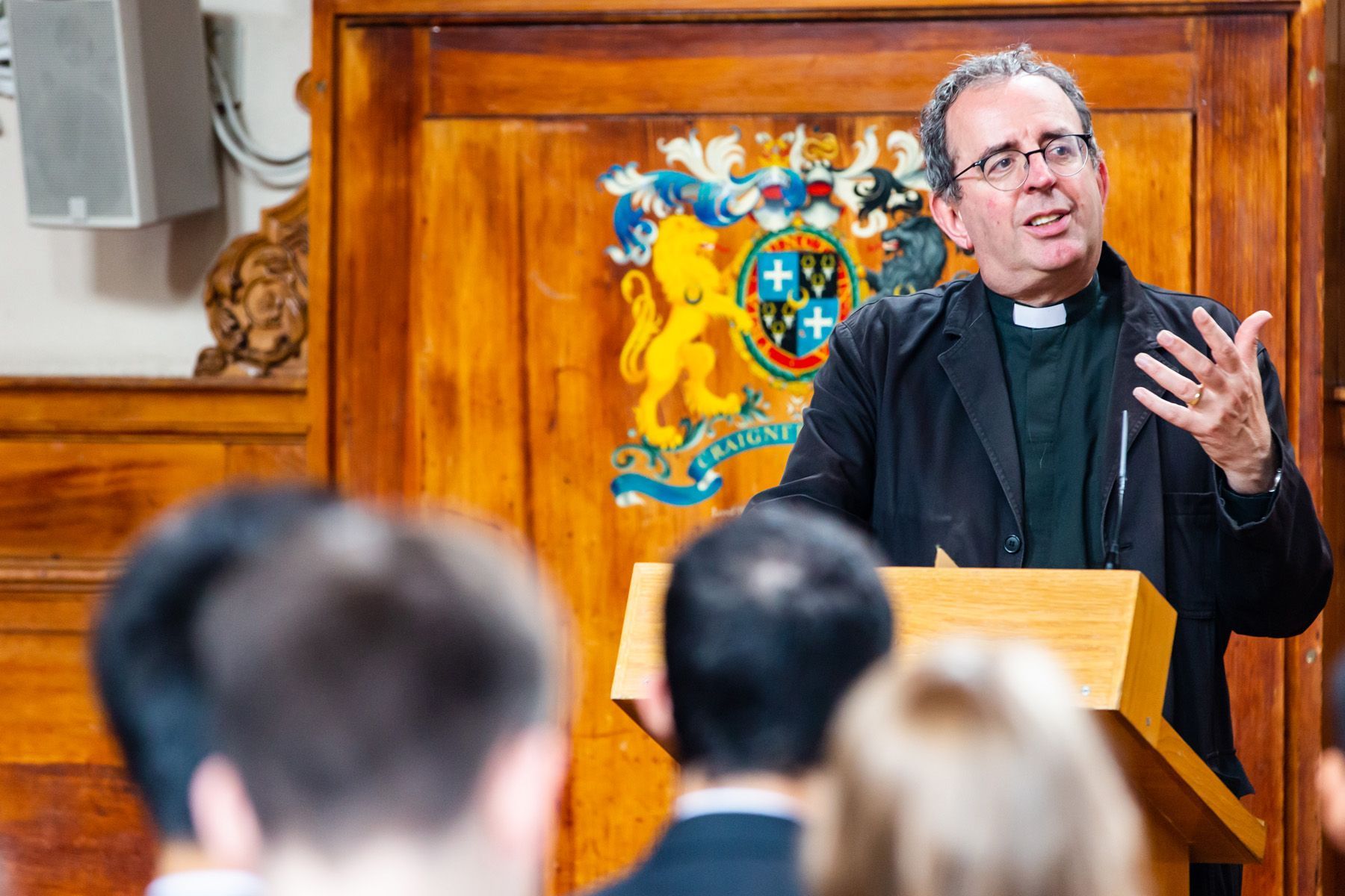 event photography reading, Reverend Richard Coles speaking at school event