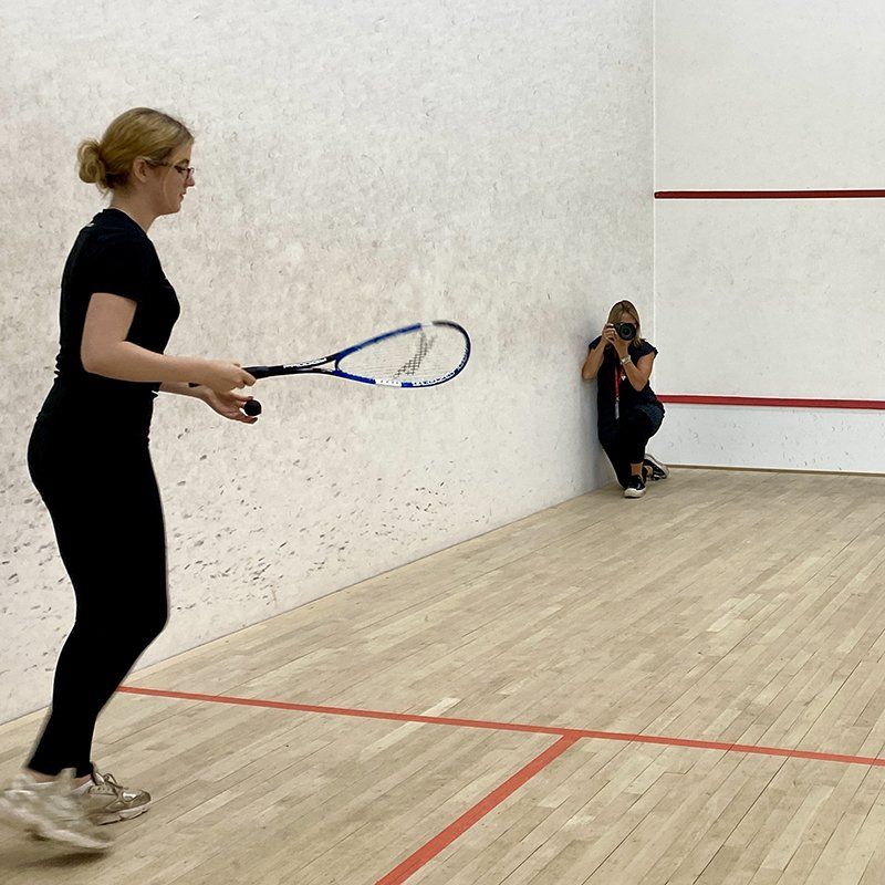 professional photographer reading squash court