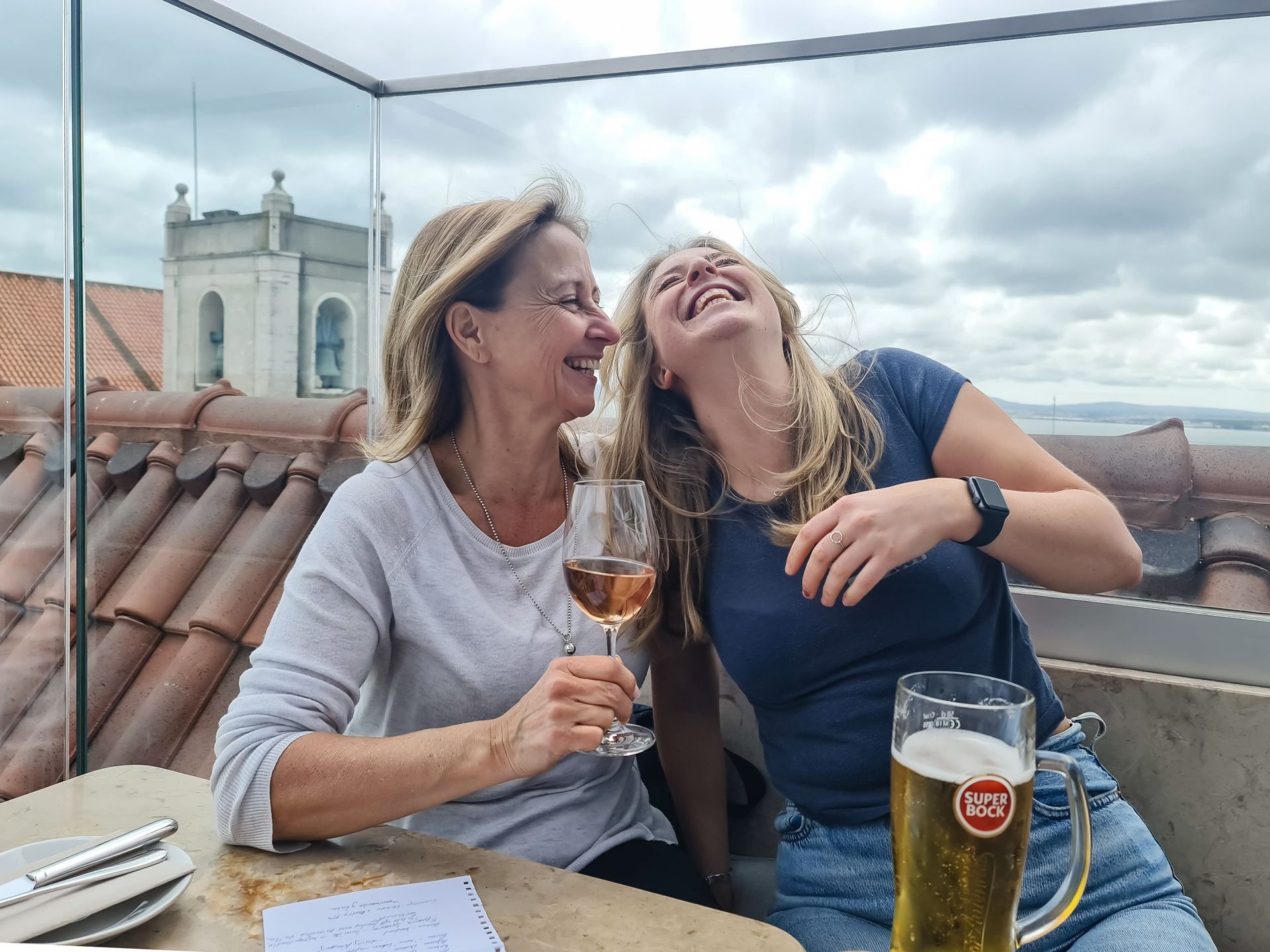 professional photography berkshire, mother and daughter laughing on roof bar