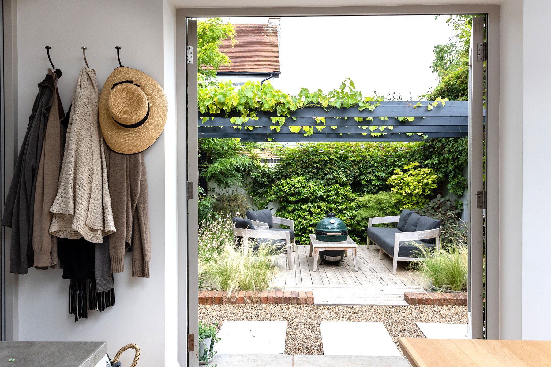Professional property photography of a beautiful house interior looking out towards garden