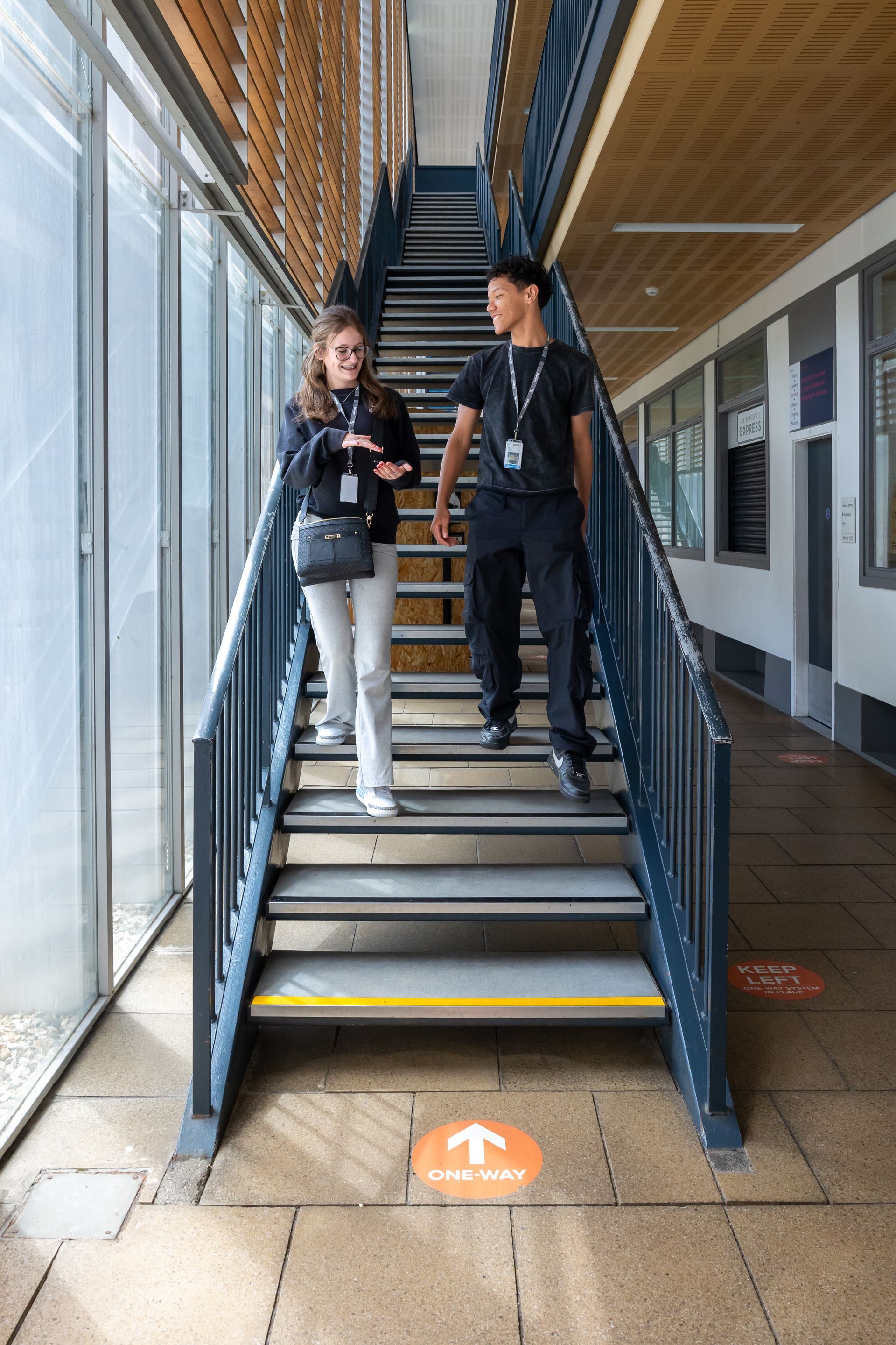 school-website-photographer-college-universities-Berkshire, 6th form students walking down stairs