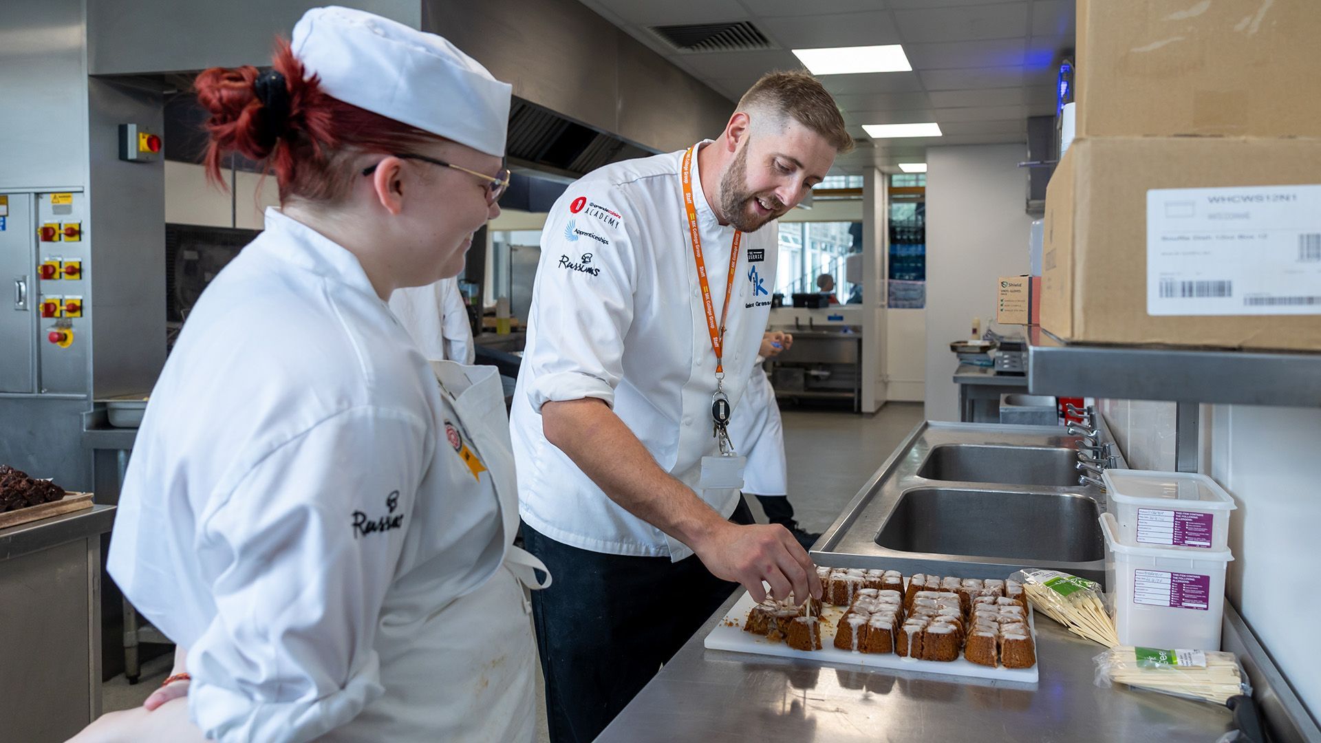 school website photographer college universities Berkshire, catering college student with tutor in kitchen