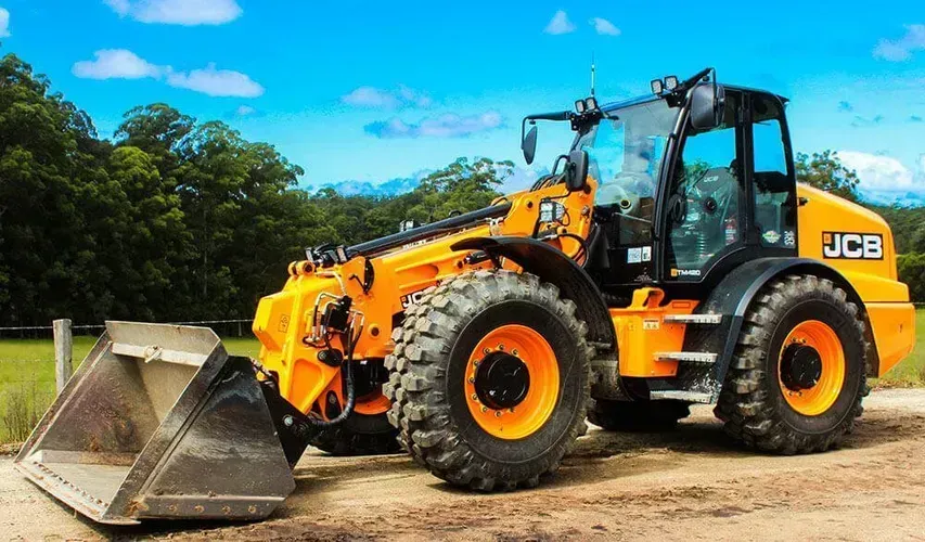 Yellow JCB Wheel Loader on a Dirt Road — Blue Dog Earthmoving Landscape Supplies in Newee Creek, NSW