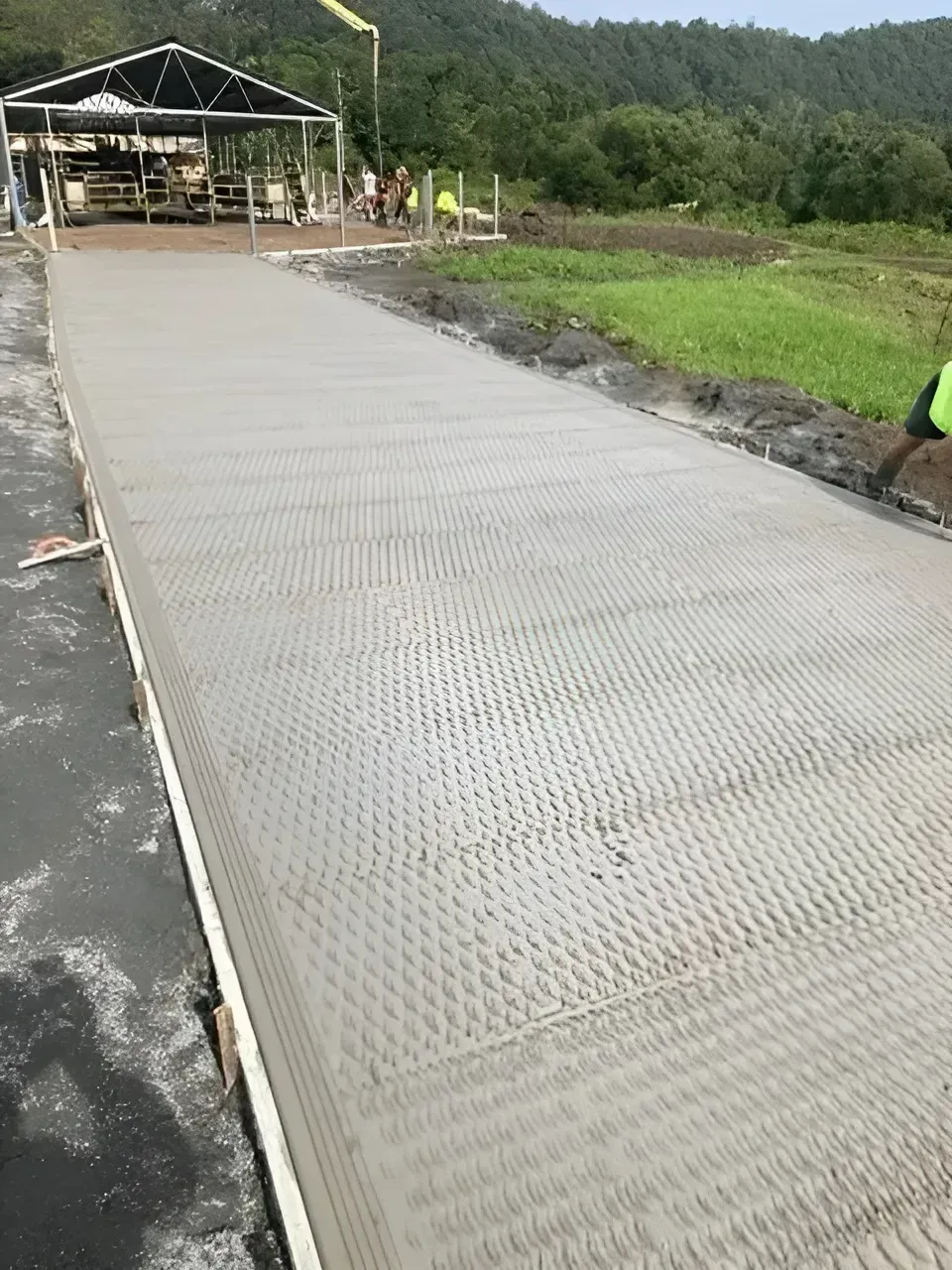 Freshly Poured Concrete Pathway With a Textured Surface — Northern Rivers Concrete Construction in Ballina, NSW