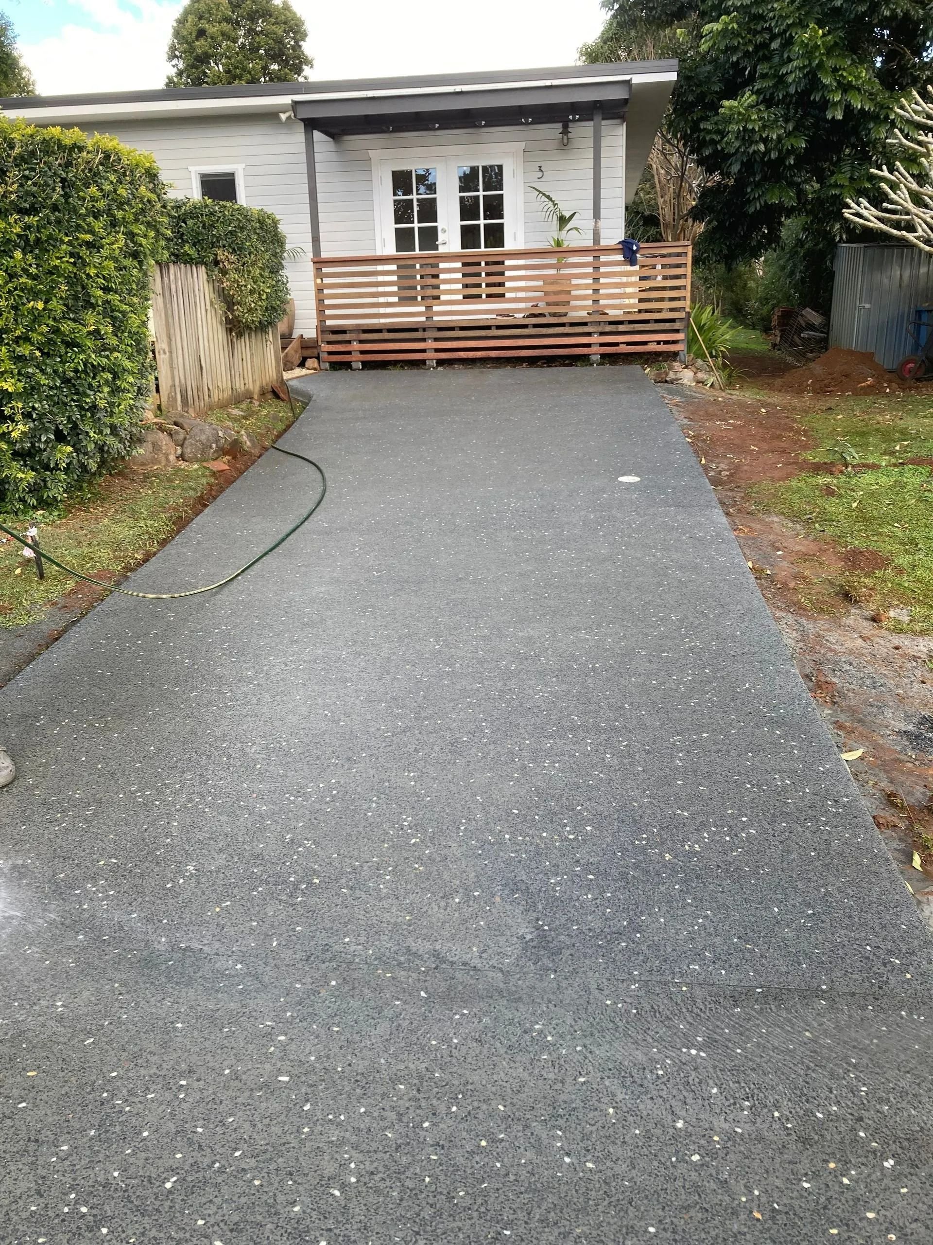 Gravel Driveway Leading to a Small House — Northern Rivers Concrete Construction in Lismore, NSW